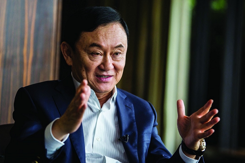 Ông Thaksin sẽ trở về sau 15 năm sống lưu vong