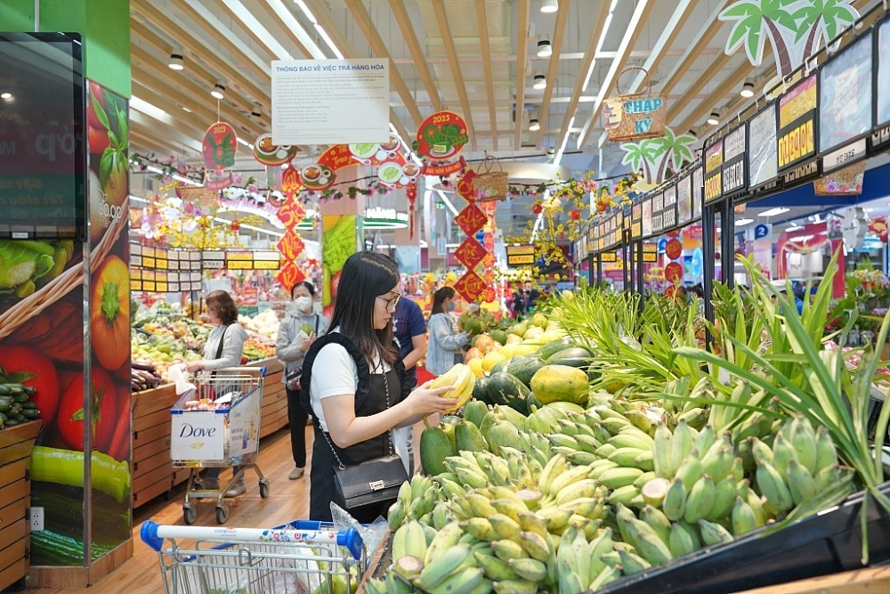 Các nhà bán lẻ tung loạt chương trình khuyến mãi để kích cầu mua sắm dịp cuối năm. 	Ảnh: T.D