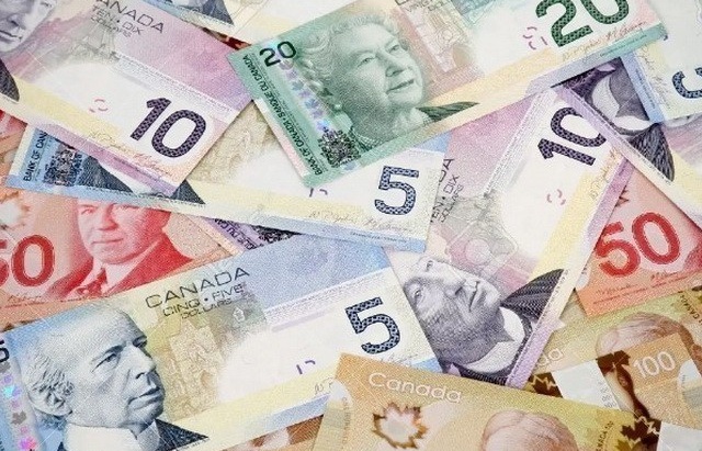 Canada thành nước đầu tiên trong nhóm G7 hạ lãi suất sau dịch Covid-19