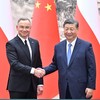 Chủ tịch Trung Quốc Tập Cận Bình và Tổng thống Ba Lan Andrzej Duda. (Nguồn: Xinhua)
