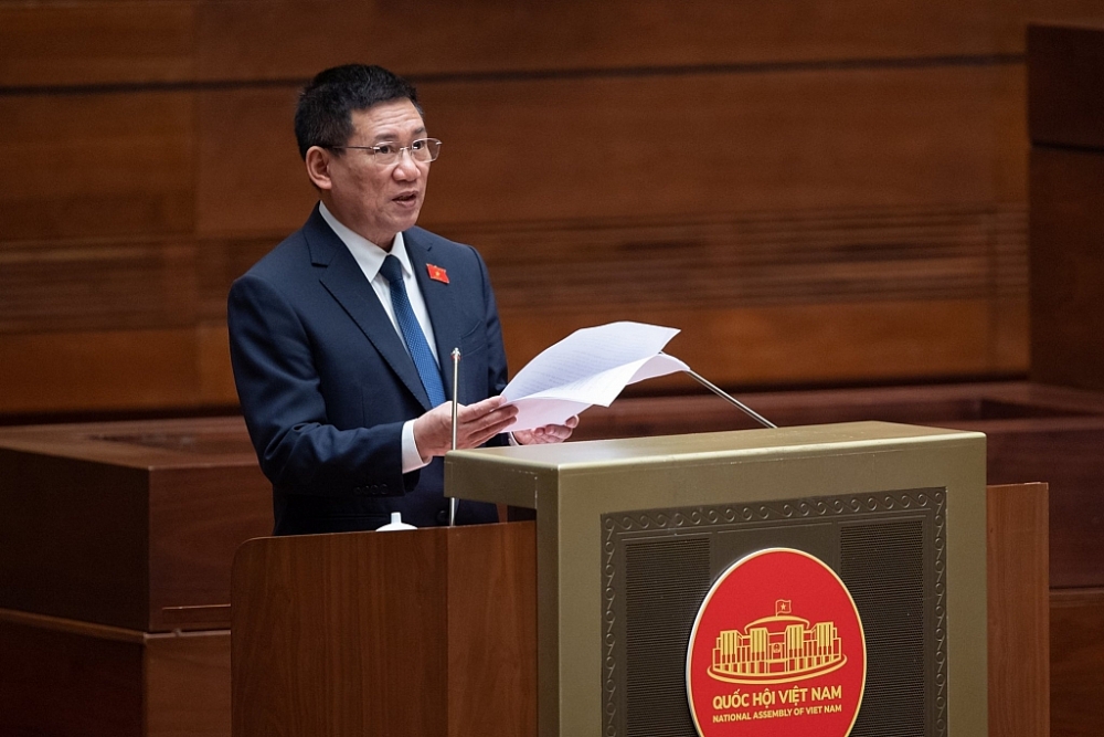 ộ trưởng Bộ Tài chính Hồ Đức Phớc, thừa ủy quyền của Thủ tướng Chính phủ trình bày Báo cáo quyết toán ngân sách nhà nước năm 2021Ảnh: Quochoi.vn