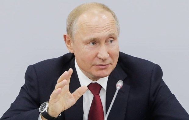 Ong Putin: Kinh te Nga da vuot qua khung hoang do dich COVID-19 hinh anh 1