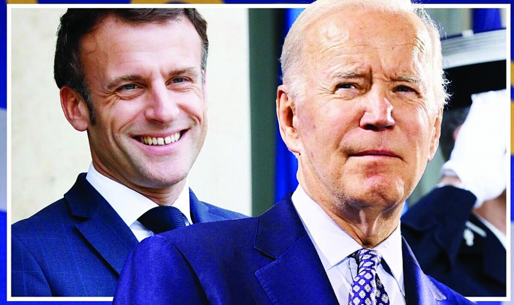 Tổng thống Macron (trái) và người đồng cấp Biden